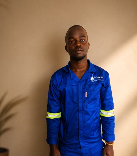 Mvikeli Cleaners team member in branded workwear